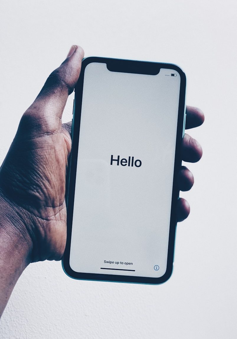 person holding black android smartphone